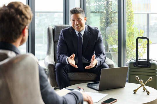 Business Talks in Hotel Lounge