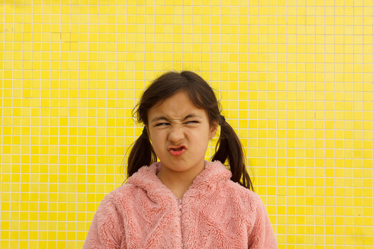 Child Makes a Funny Face 