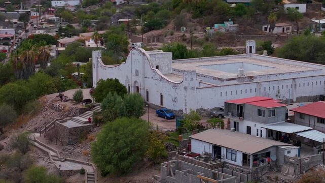 Discover aerial views of historical Mulege jail and the surrounding town in Baja California Sur, Mexico next to the Sea of Cortez.