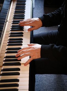Pianist hands top view during a piano practice