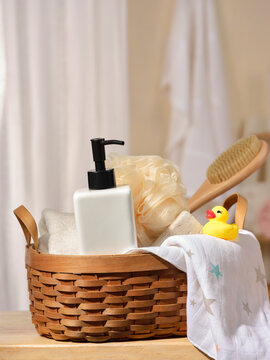 Natural bathroom essentials are organized in a woven basket