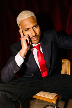 Confident man in suit thinking portrait