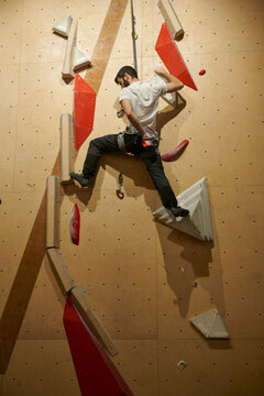 Man Rock Climbing