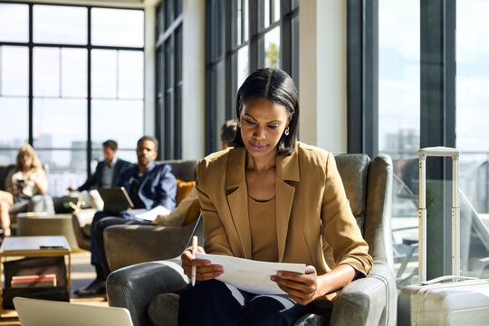 Businesswoman checking documents