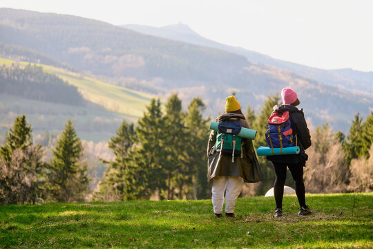 Hikers enjoying mountain view in nature
