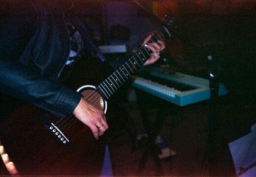 Musician Playing Guitar on 35mm Film