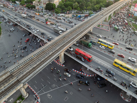 Elevated railway above city traffic