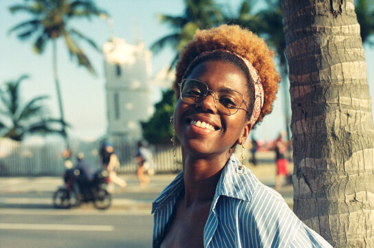 Smiling by the Palm