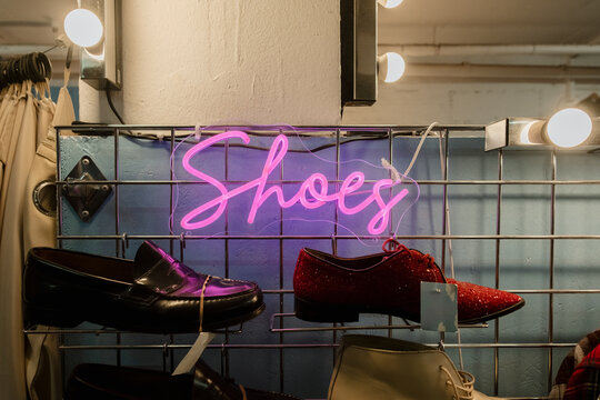 Shoes neon sign glowing in a retail shop display