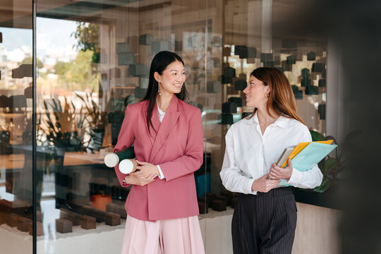 Portrait of two young professional women at work