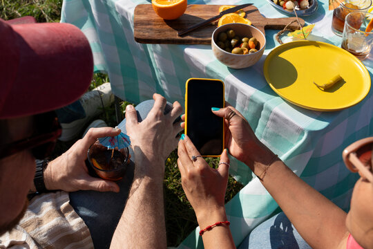 Phone Picnic Table Hands