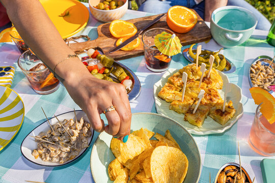 Sharing Spanish Vermut Tapas Outdoors