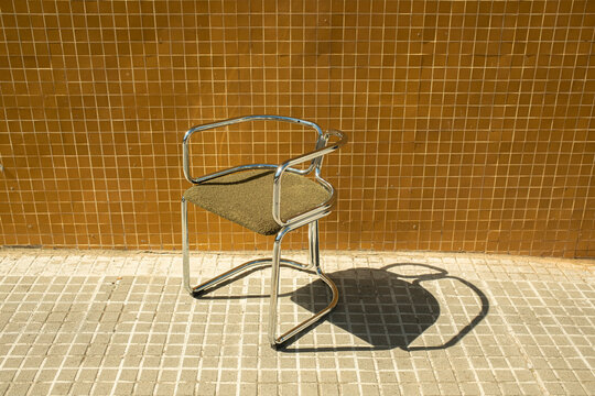 Vintage metal chair in the street