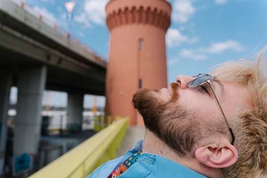 Close profile portrait of bearded man