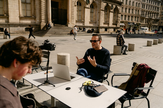 middle aged man vlogging in Lyon France 