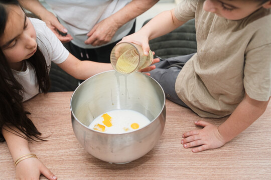Grandma and Grandkids Bake a Cake Together
