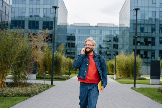 Man walking in office courtyard