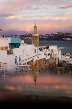 Mosque and cityscape of Tangier city at sunset