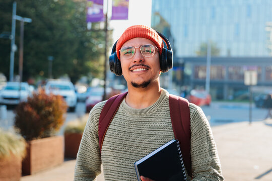 Latin student man looking at camera