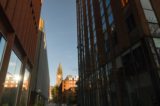 Tall Buildings Surround the Old Clock Tower 