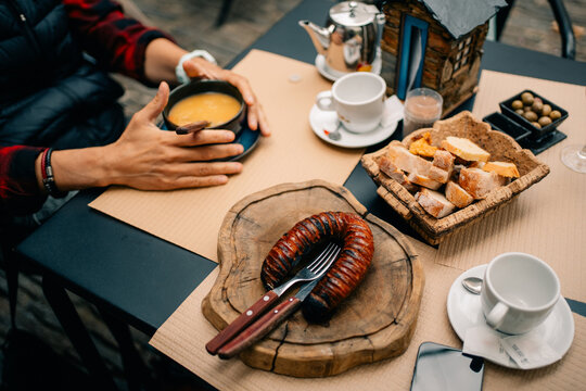 Eating at a Cafe With Traditional Food and Drinks in the Afternoon