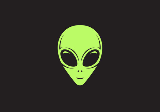 Lime Green Alien Face Icon Isolated on Black Background - Minimalist Extraterrestrial Head Graphic for Science Fiction and UFO Concepts