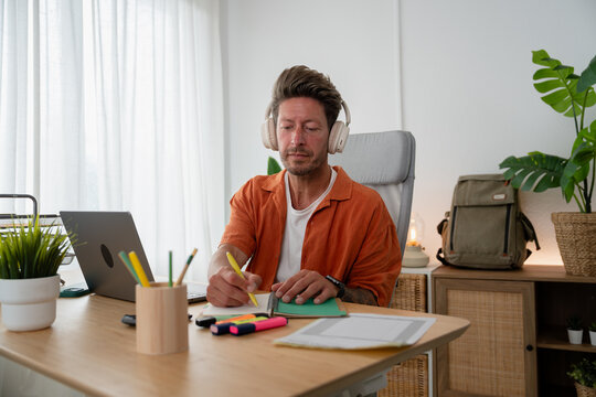 Man concentrating and enjoying remote work
