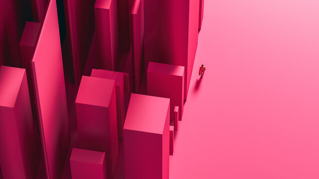 Businessman walks near buildings in a pink city