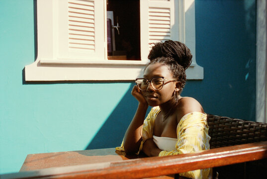 Resting By Blue Wall