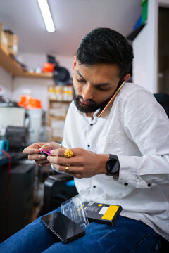 Fixing smartphone at repair workstation