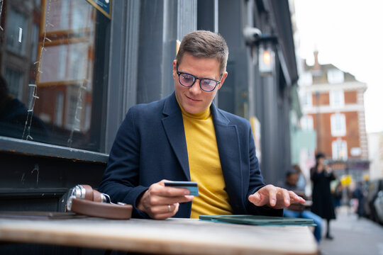 Paying online with credit card on smartphone in London