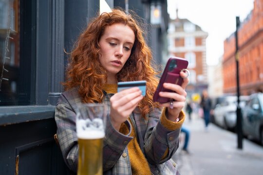 Using bank card and smartphone 