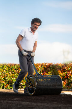 Close Up Lawn Roller on Soil
