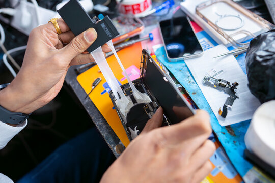 Close up smartphone repair process