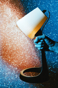 Lit Table Lamp on Sparkling Background