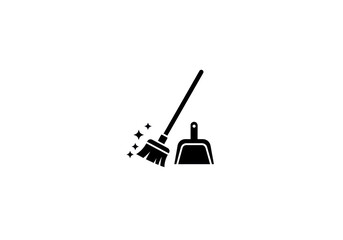 Fototapeta premium Cleaning tools with a broom and dustpan set against a simple background