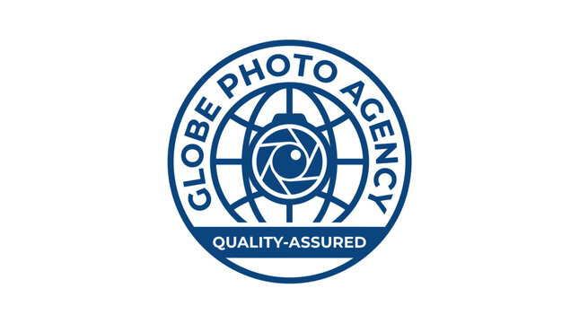 Globe photo agency logo with camera iris and world map graphic element
