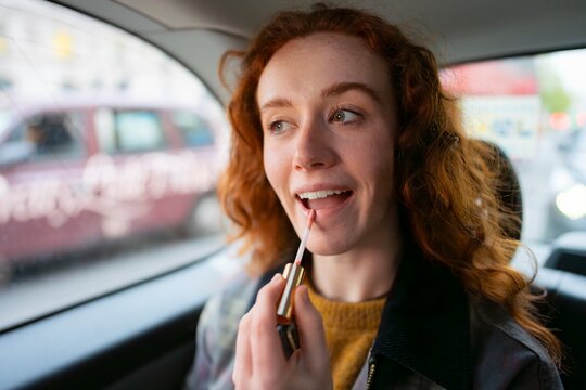 Applying makeup during London taxi ride
