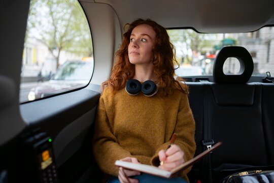 Looking outside window during London taxi ride