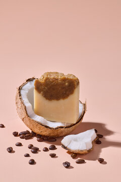 Natural Coconut Soap with Coffee Beans on Peach Background