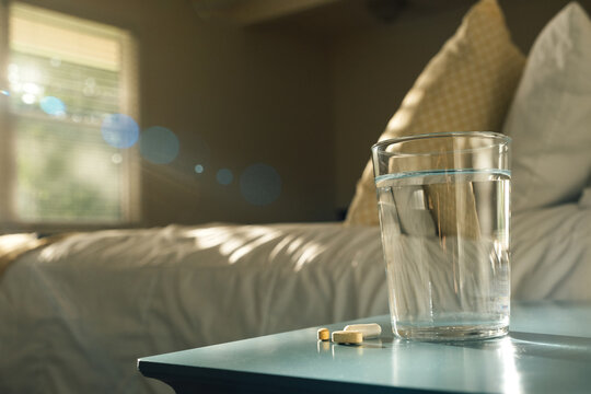 Vitamin Pills and Water Morning Bedroom at Home