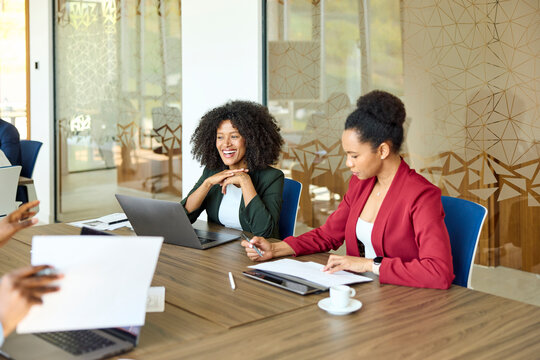 Team Meeting Takes Place in a Bright Office