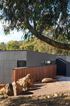 Modern House Design in Nature With Landscaped Stone Feature