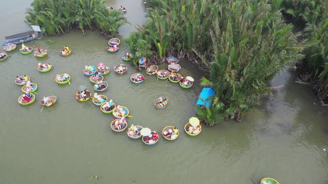 Aerial view of coconut forest and river cruise in basket boats, Hoi An, Vietnam.