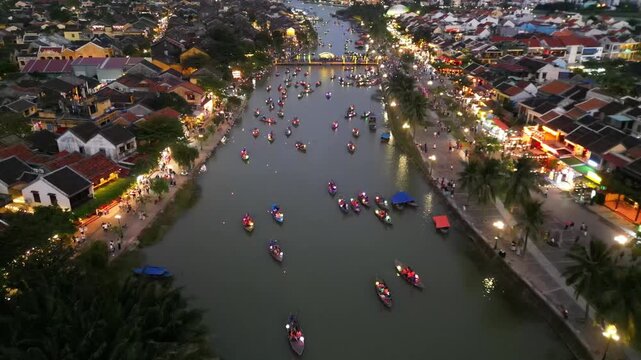 Aerial view of Hoi An ancient town after sunset in Vietnam.