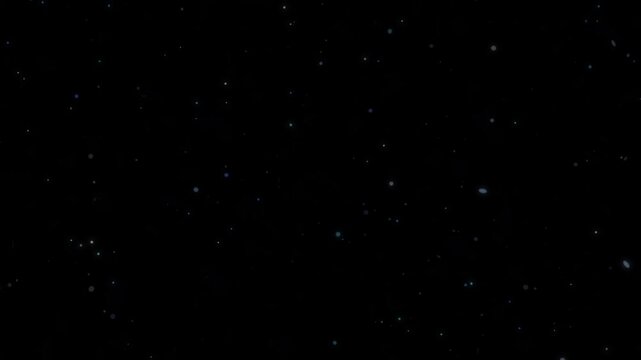 Subtle cool blue particles slowly floating and drifting on a deep black background seamless loop motion