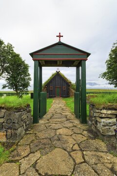 Grass sod house, green roof, Vidimyrarkirkja peat church, Vidimyri, near Varmahlid, Skagafj&ouml;r&eth;ur, Iceland