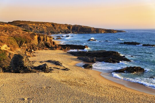 Coastline, rocky coast and beach, Praia do Malh&atilde;o, evening light, Vila Nova de Milfontes, Vicentine Coast and Southwest Alentejo Natural Park, Costa Vicentina, Portugal