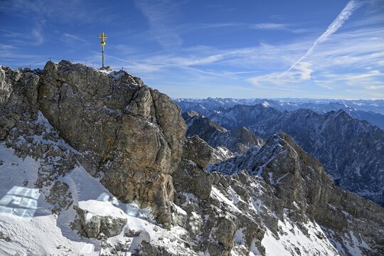 Zugspitze summit cross (2962 m), in the background the Wetterstein Mountains, Grainau municipality, Garmisch-Partenkirchen district, Bavaria, Germany