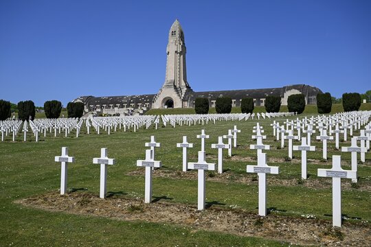 Cemetery of soldiers killed in the First World War, in the background the ossuary of Douaumont, Verdun, Grand Est region, France